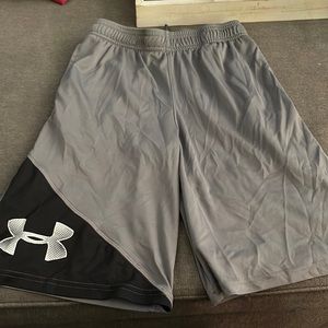 Gray and black under armor shorts